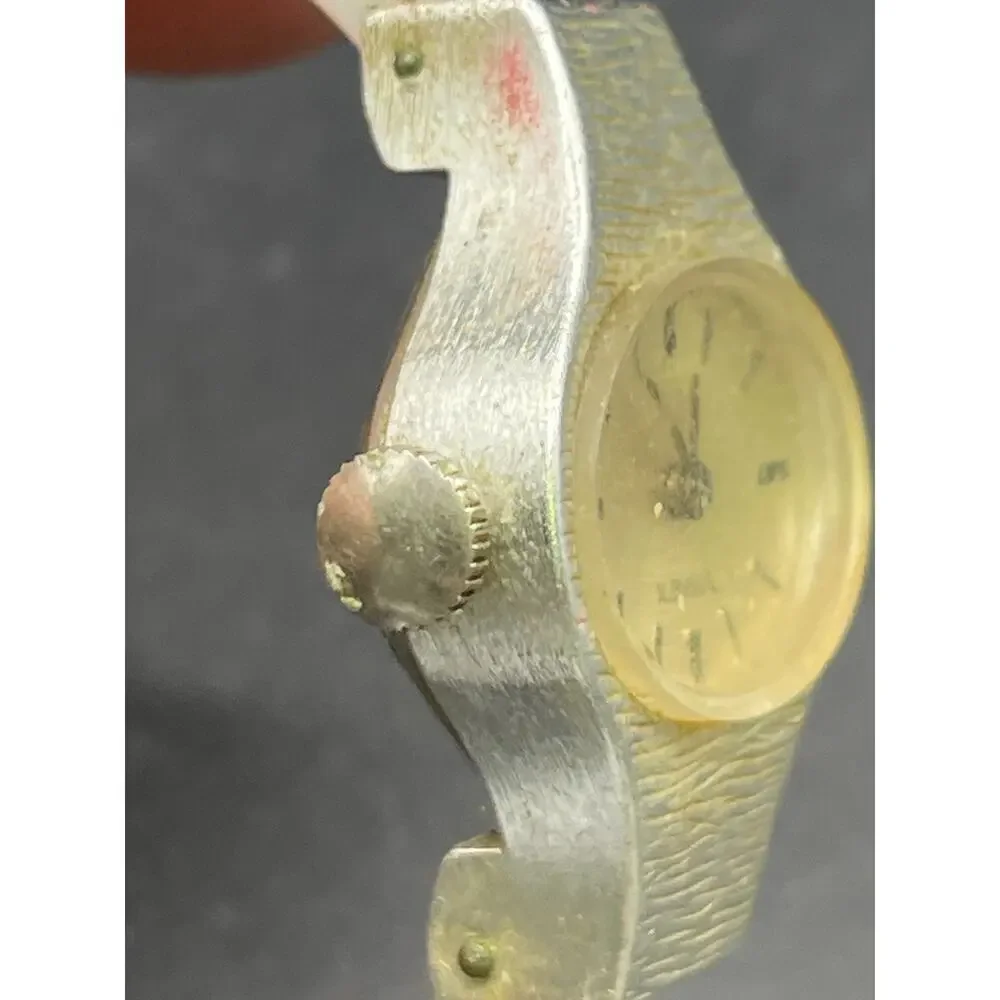 Vintage Timex Watch Women Silver Tone Oval Dial Cuff Band Manual Wind 20mm